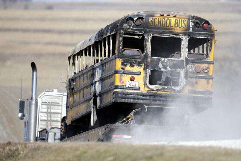 Iowa district to pay $4.8M to settle suit in fatal school bus fire