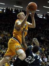 Iowa's Aaron White honors the past with all-around performance in victory (with photo slideshow)