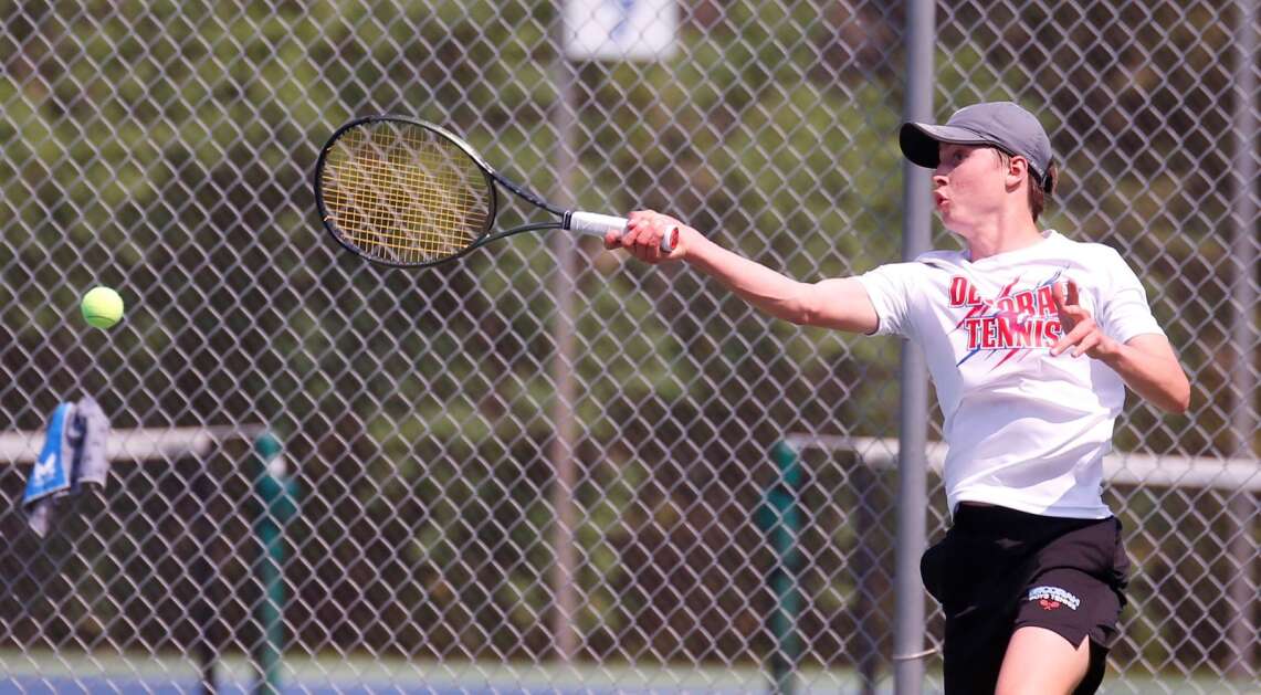 Decorah’s Caden Branum returns a shot during the boys’ state tennis singles in Waterloo on Wednesday, May 24, 2023. Branum went on to win the Class 1A state title, a first for the Vikings. (Jim Nelson/Waterloo Courier)