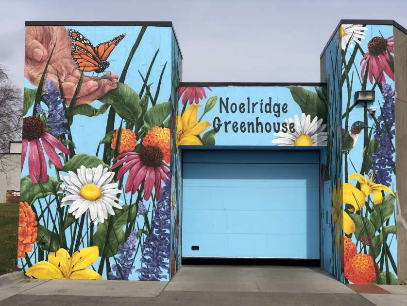 Photo of the completed first phase mural at the Noelridge Greenhouse on 4900 Council St. NE in Cedar Rapids (courtesy of Mary Moore)