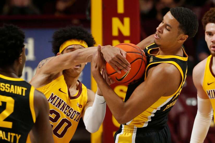 Iowa Hawkeyes bent, and bent some more, but snapped back for 81-71 win at Minnesota