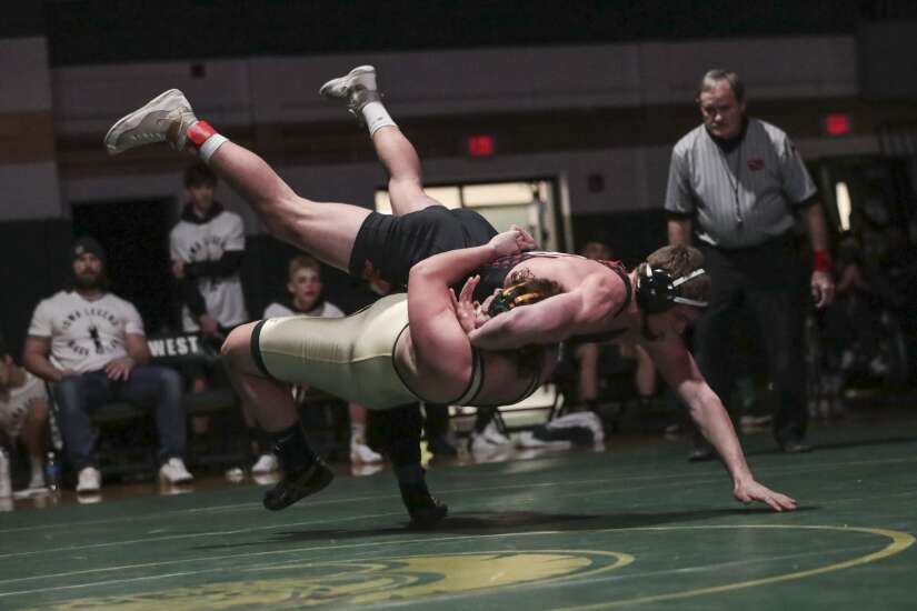 Photos: City High vs. Iowa City West wrestling dual