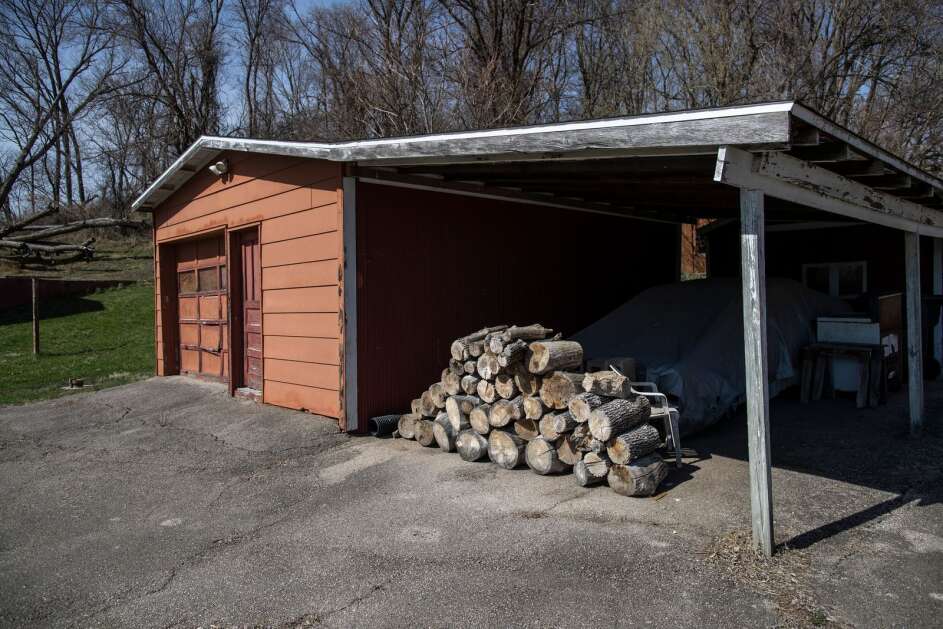 A garage that was formerly used as a kennel has since been converted back at the former homestead of Charles “Chuck” Lockhart, who was the first appointed poundmaster and dog warden for the city of Cedar Rapids in 1959. Jim Clark, his grandson and a former animal control officer for the city, recalls a time growing up where his grandfather had 16 kennels in the garage. (Geoff Stellfox/The Gazette)