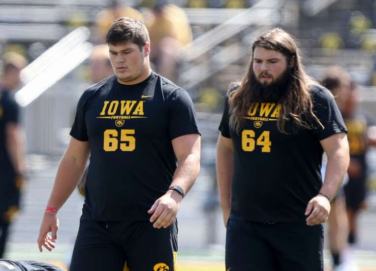 Iowa football notebook: Linderbaum, Moss undecided on whether to declare for NFL Draft