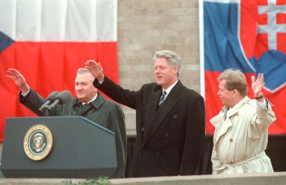 President Bill Clinton (center), Czech President Vaclav Havel (right) and Slovak President Michal Kovac wave Oct. 21, 1995, during the dedication ceremony for the National Czech & Slovak Museum & Library in Cedar Rapids. The historic moment underscores the relationships the museum helps maintain with the Czech and Slovak republics. (The Gazette)