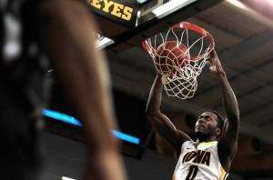 Iowa dunks over and through Coppin State