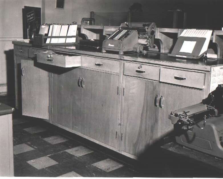 Evidence photo shows the inside of Family Finance, where Fred Coste, 47, was killed Oct. 15,1959, in Cedar Rapids. Police said money was taken from the cash drawers and blood stains were found on the counter and drawers. Coste’s murder remains unsolved. (Photo submitted by Cedar Rapids Police Department)