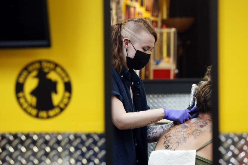 Tattoo shops in Cedar Rapids, Iowa City in high demand, filling up schedules for months 
