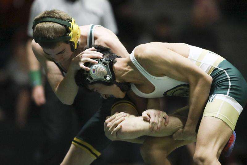 Photos: High school wrestling, Cedar Rapids Kennedy vs. Iowa City West