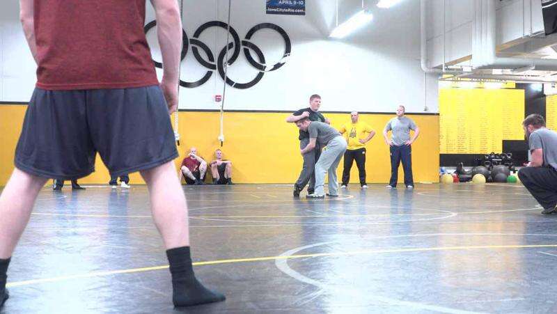 Iowa City, UI police learn defensive tactics from Hawkeye wrestlers