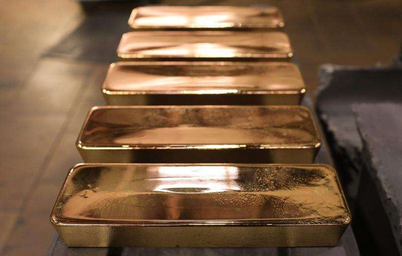 Gold is at a an all-time high. Should you buy, sell or wear it?