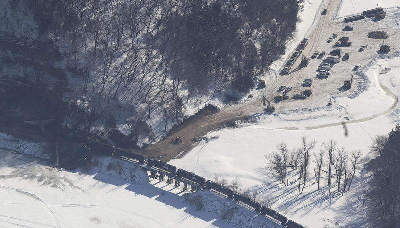 Railroad draining ethanol from derailed train cars near Dubuque, monitoring river