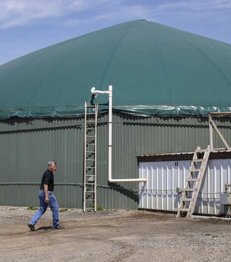 Anaerobic digesters turn manure into energy. But they have critics.