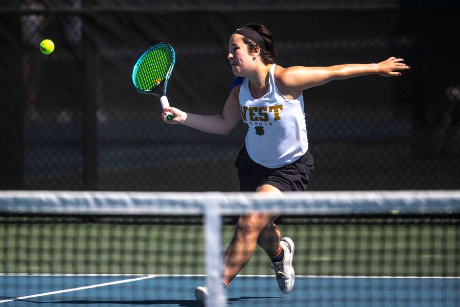 Iowa City West’s Julianna Mascardo fires a shot over the net during the Iowa high school girls 2A state tennis tournament on Friday, May 26, 2023, at Hawkeye Tennis and Recreation Complex in Iowa City, Iowa. Mascardo advacned to the semi finals. (Geoff Stellfox/The Gazette)