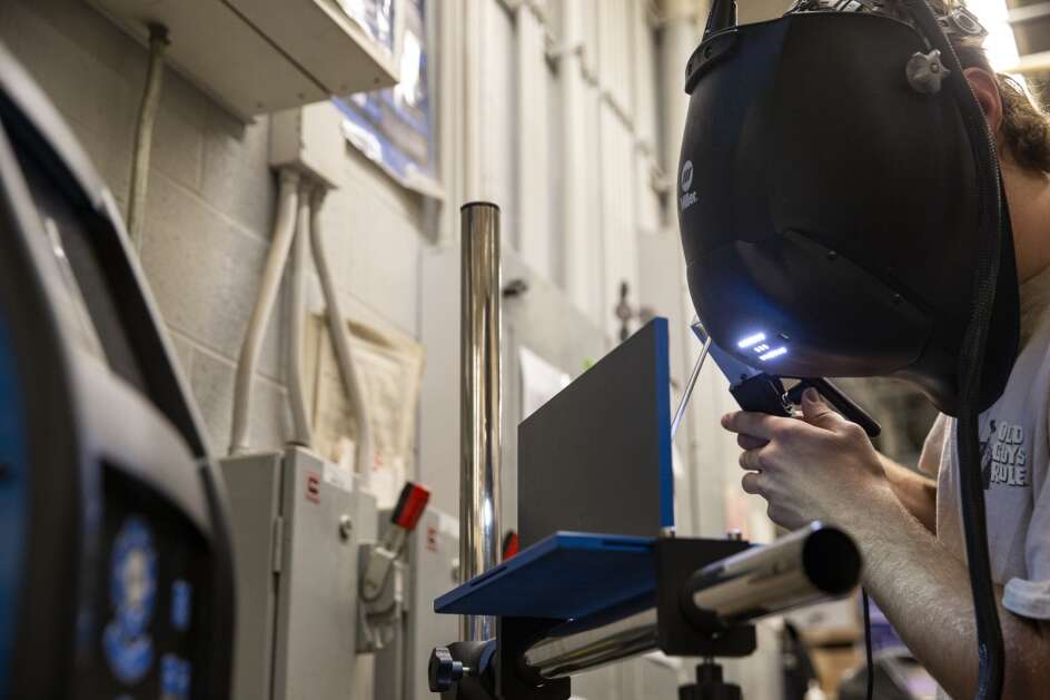 Williamsburg High School senior William Van Dee works on his welding technique using a virtual reality machine during a May 9 introduction to engineering class at the school in Williamsburg. The VR simulators teaches students welding techniques before they do “live” welds. (Savannah Blake/The Gazette)