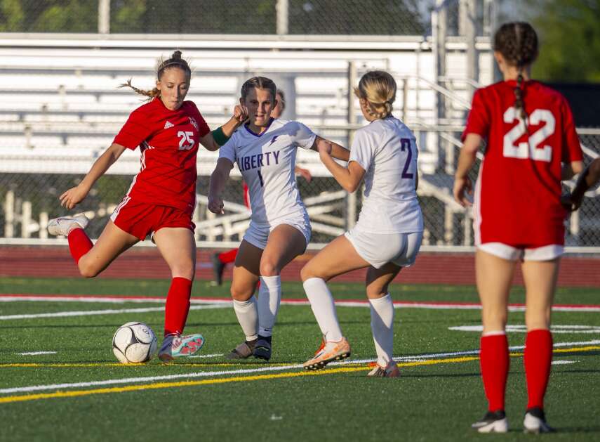 Marion midfielder Selah Hill-Dale (25) kicks the ball into the Liberty goal and gets the third goal for the Wolves in the first half of the game against Liberty at Marion High School in Marion, Iowa on Thursday, May 25, 2023. (Savannah Blake/The Gazette)