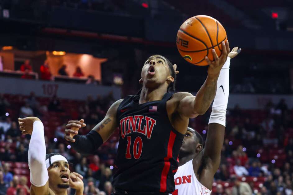 UNLV guard Keshon Gilbert (10) lays up the ball past Dayton during the first half of an NCAA college basketball game Tuesday, Nov. 15, 2022, in Las Vegas. (AP Photo/Chase Stevens)