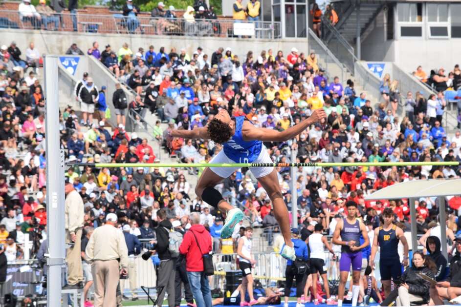 Columbus’ Triston Miller gets over the high jump bar at 6’6 at the High School Track and Field Championship. Miller finished second in the event. (Hunter Moeller/The Union)