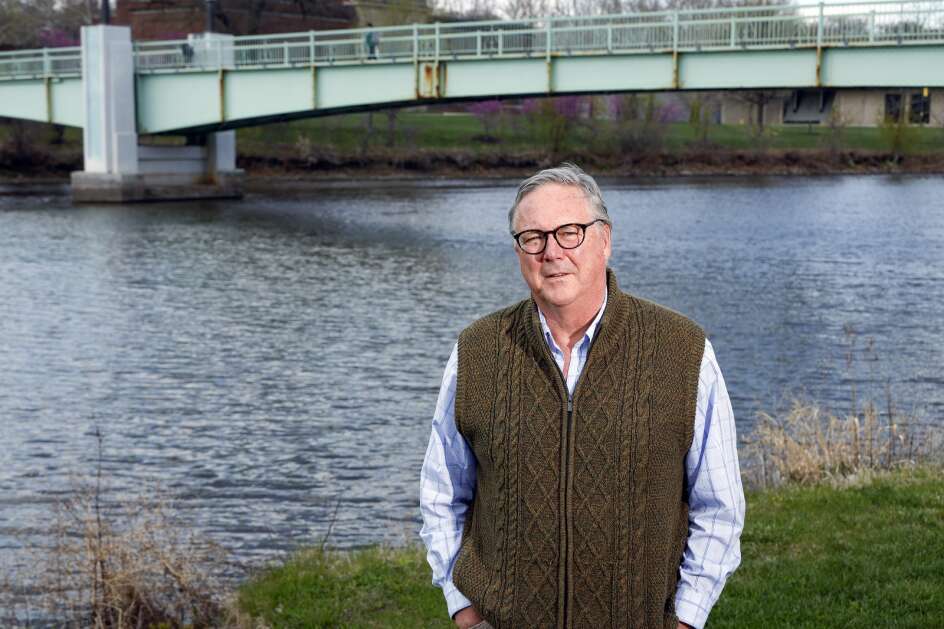 University of Iowa research scientist Chris Jones stands Tuesday along the Iowa River behind the Iowa Memorial Union in Iowa City. Jones has been outspoken about the toll Iowa agriculture has taken on water quality. (Jim Slosiarek/The Gazette)