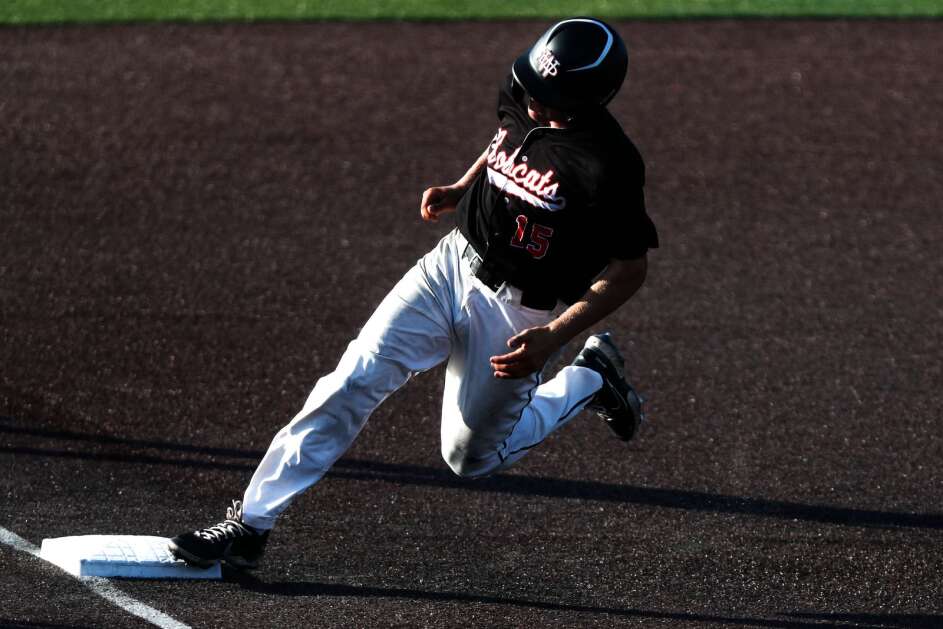 Western Dubuque’s Brett Harris (15) rounds third base during the 3A State Baseball Championship game on Friday, July 22, 2022, at Duane Banks Stadium in Iowa City, Iowa. (Geoff Stellfox/The Gazette)