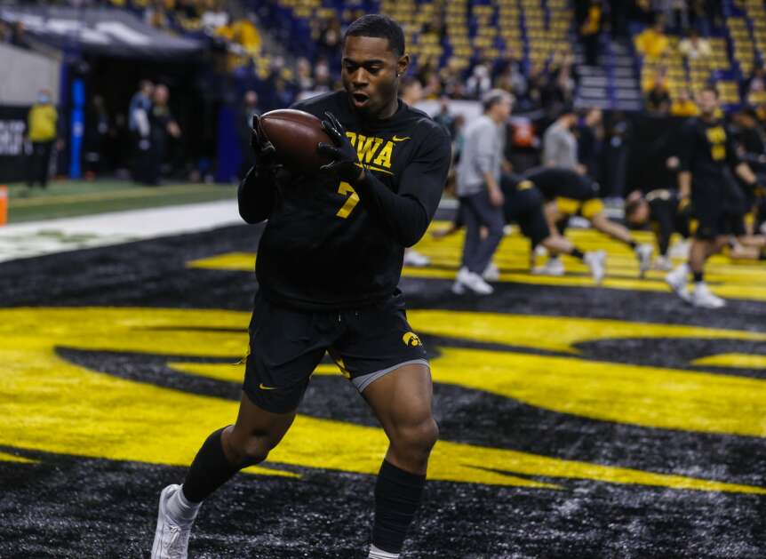 Then-Iowa Hawkeyes defensive back Reggie Bracy (7) warms up Dec. 4, 2021, before the Big Ten Championship football game between the Iowa Hawkeyes and the Michigan Wolverines at Lucas Oil Stadium in Indianapolis. (Jim Slosiarek/The Gazette)