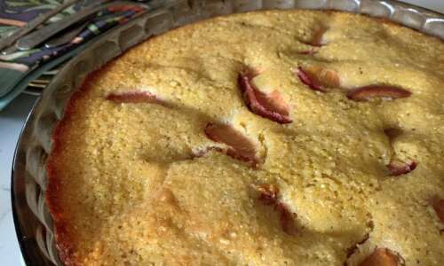 This sweet cornbread recipe with peaches or plums is made…