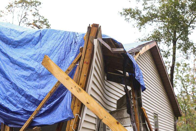 Tarps covering derecho damage prove no match for ongoing rain