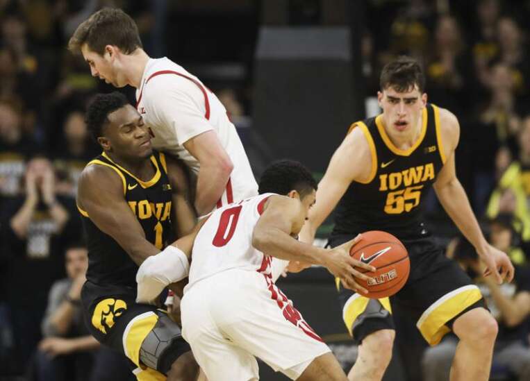 Iowa men's basketball rallies from 12 points down to beat Wisconsin