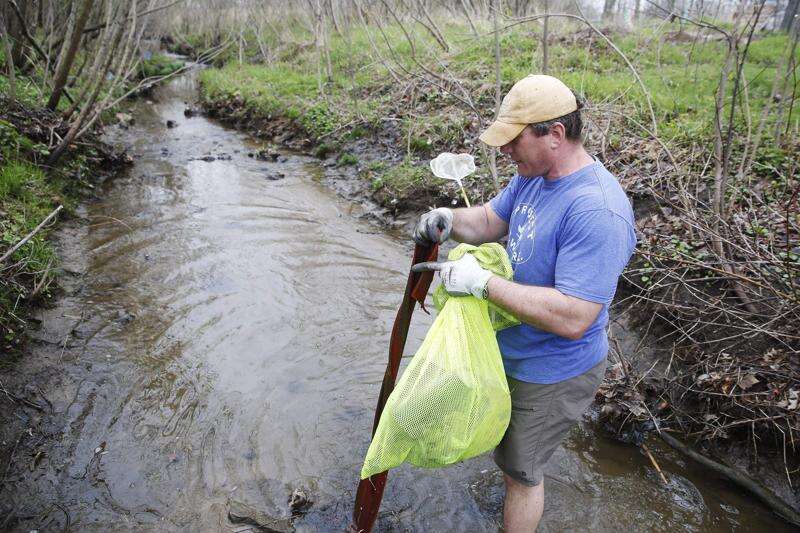 Marion family names creek, cleans it of hundreds of pounds of garbage