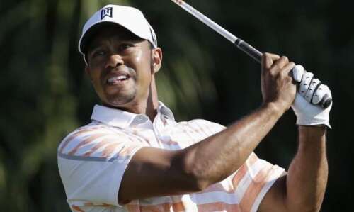 PGA: Johnson shoots 5-under, Tiger still leads