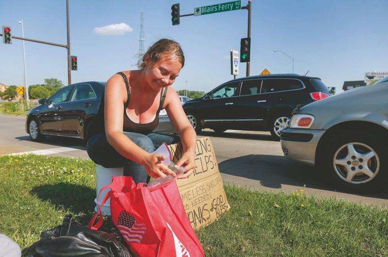 Pedestrian safety rules that restrict panhandling get initial approval in Cedar Rapids