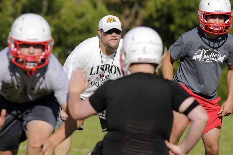 Speed developed on state champion track teams key to Lisbon football's success