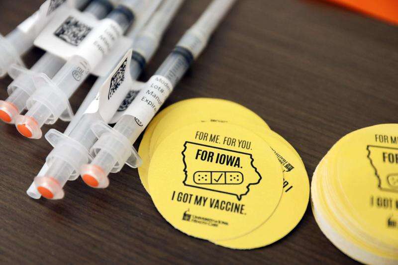 How many COVID-19 vaccines have been discarded in Iowa?