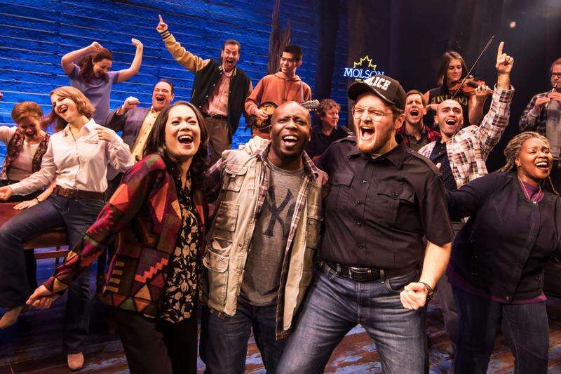 Harter Clingman (front row, right), who grew up in Cedar Rapids and Ottumwa, is shown performing in the first national tour of "Come from Away." The Tony-winning musical captures the joy that emerged from the darkness when 7,000 airline passengers were diverted to a small town in Newfoundland after the terrorist attacks in the United States on Sept. 11, 2001. He is listed in the cast of the current national tour, coming to Hancher Auditorium in Iowa City from Oct. 3 to 5, 2023.  (Matthew Murphy)