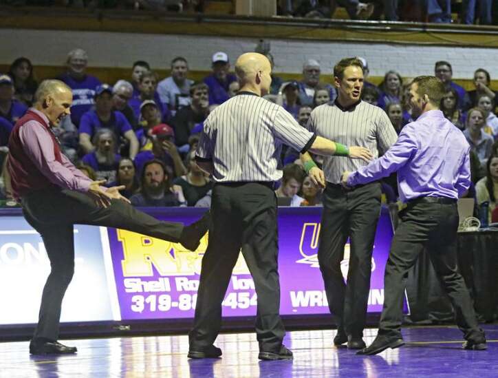 Iowa State wrestling coach Kevin Dresser brings jokes, visual aids to help hype Friday's dual with UNI