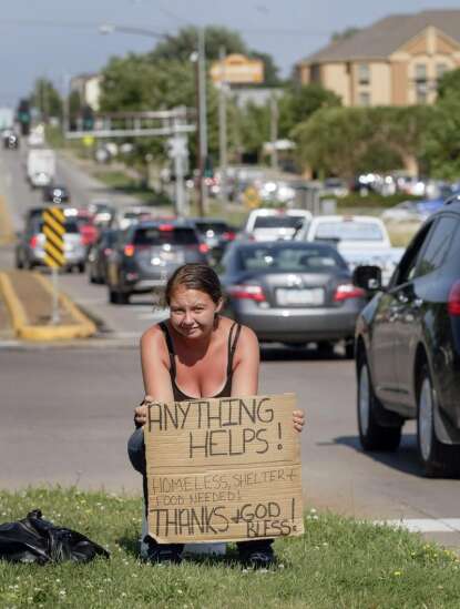 Pedestrian safety rules that restrict panhandling get initial approval in Cedar Rapids