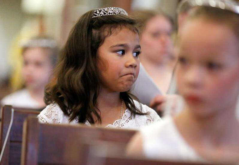 Catholic children prepare for First Communion