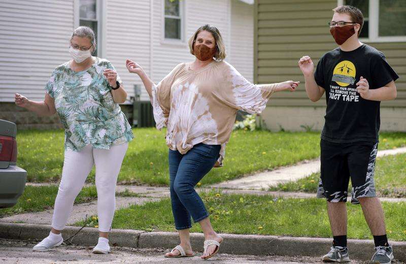 Photos and Video: Using belly dancing to connect with socially distanced neighbors in Cedar Rapids