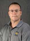 Hawkeyes' wrestling trainer summoned to duty on a Masters fairway