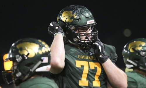 Cedar Rapids Kennedy’s Connor Colby (and his mullet) officially signs…