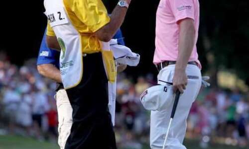 With rookie caddie, it was Johnson's Deere Classic