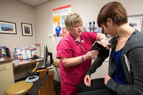 University of Iowa students paying fewer clinic visits
