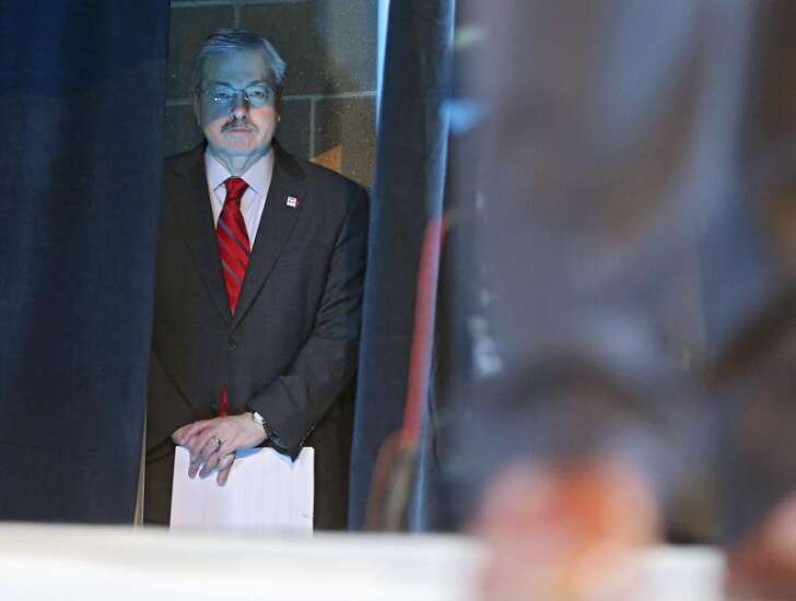 Branstad axes more than $60 million for education