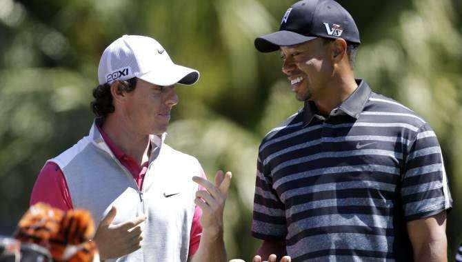 PGA: Tiger tied for lead, Johnson 32nd after one