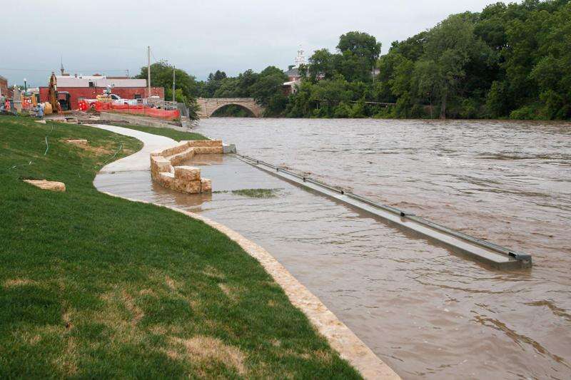 Northeast Iowa communities anxiously watch rapidly rising Turkey River