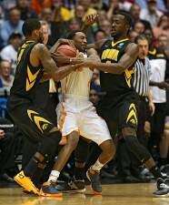 Iowa falls to Tennessee in overtime