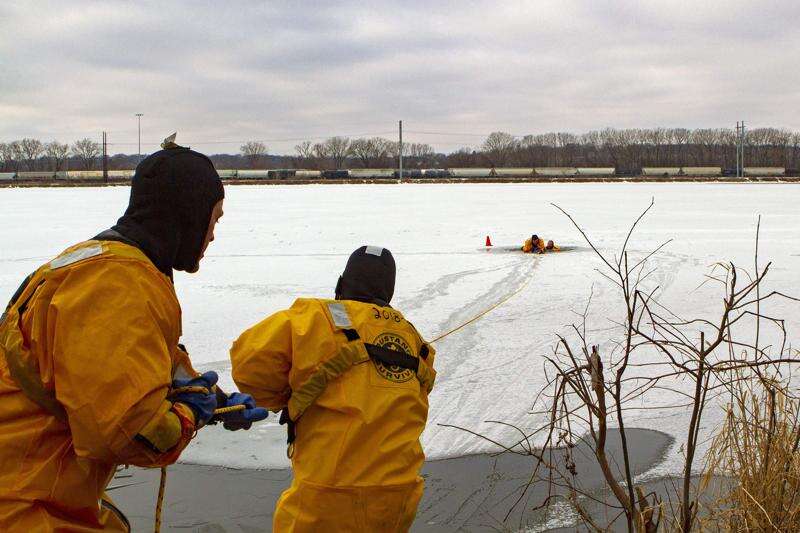 Gazette reporter plunges into frozen lake to learn ice water rescues with CRFD
