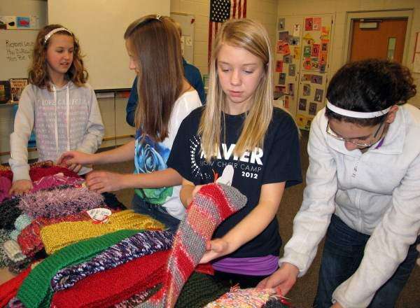 Solon students knit scarves for second-graders