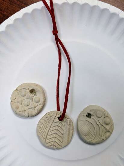 Explore texture with this clay and shoes craft