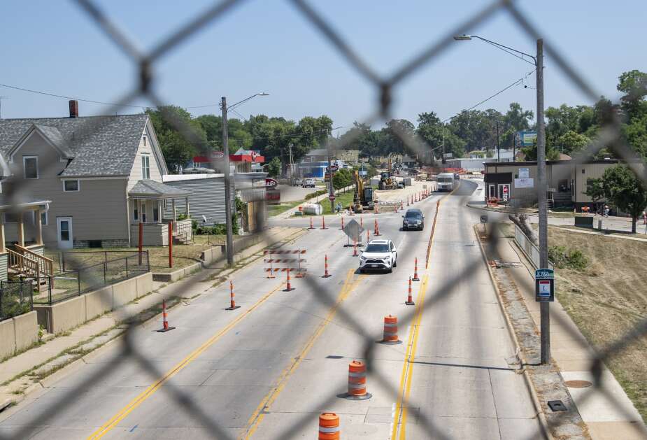 Cars drive Wednesday along a restricted route due to construction on Mount Vernon Road SE in Cedar Rapids. (Savannah Blake/The Gazette)